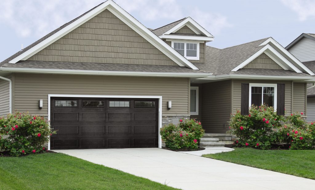 Front of home with a Thermacore windload overhead garage door