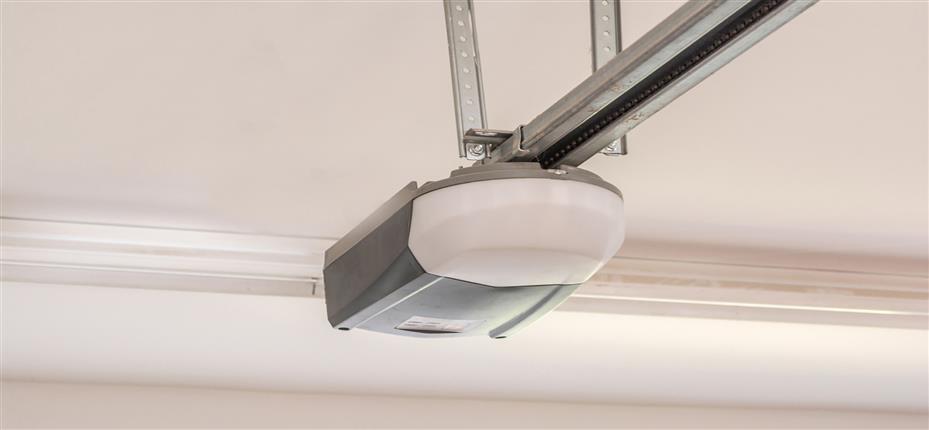 chain drive garage door opener in garage.