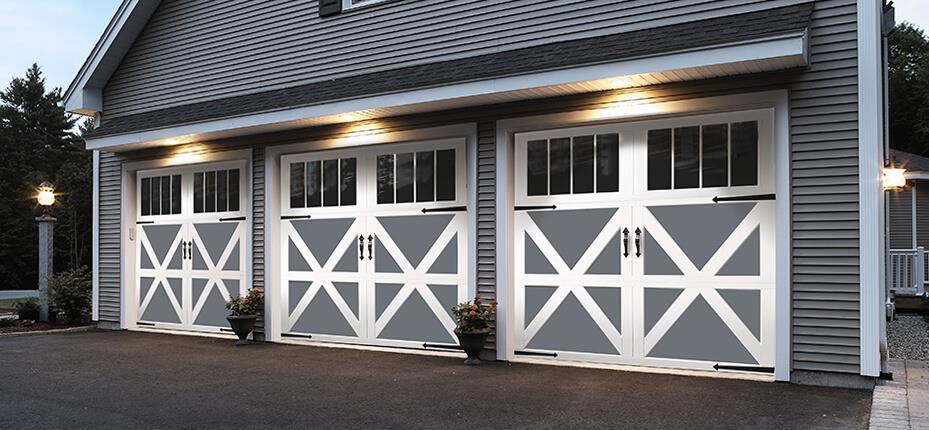 three carriage house garage doors on home exterior