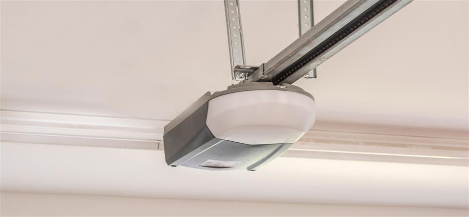 Belt driven clearance garage door opener